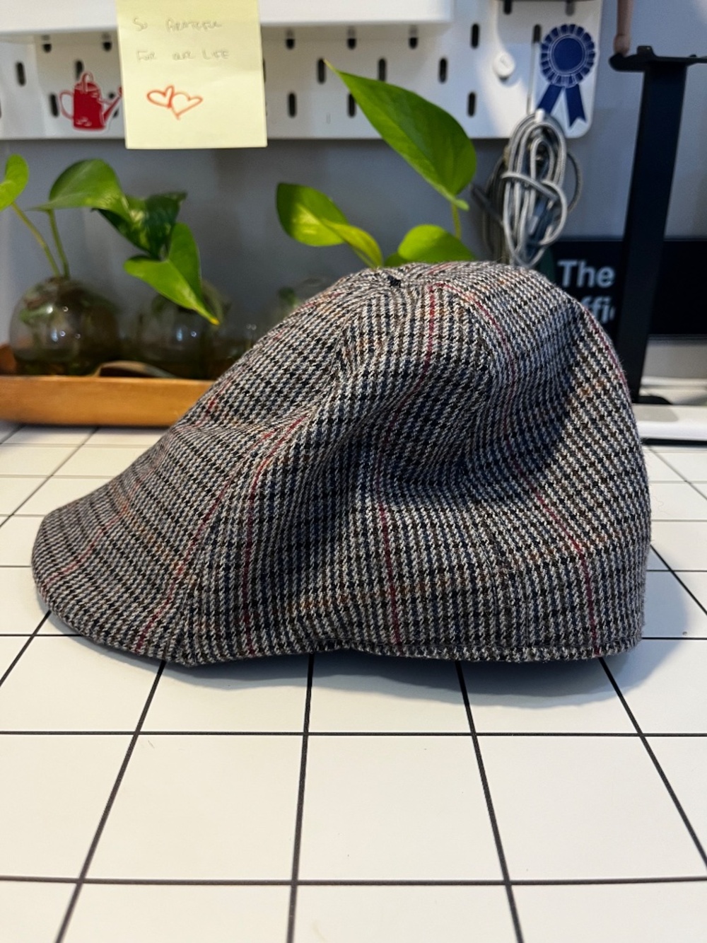 Houndstooth cap.
